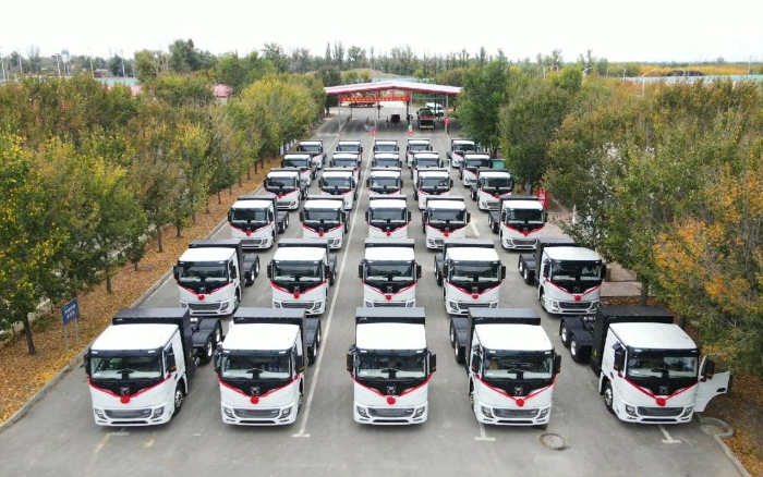 脱碳“换”绿进行时！开云线上登录新能源重卡批量交付西北